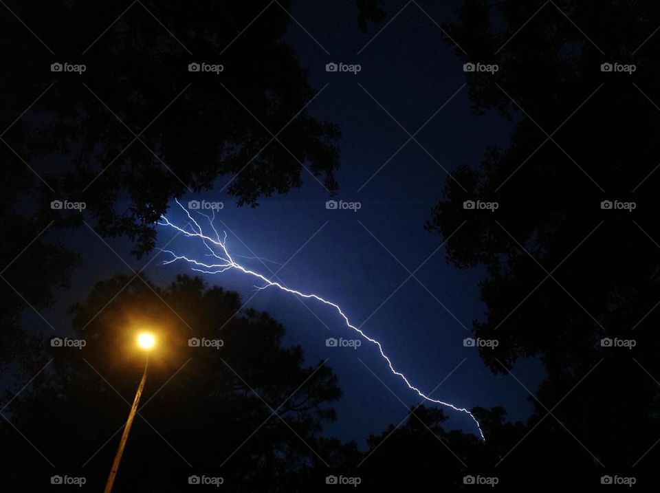 Lightning shoots through the sky