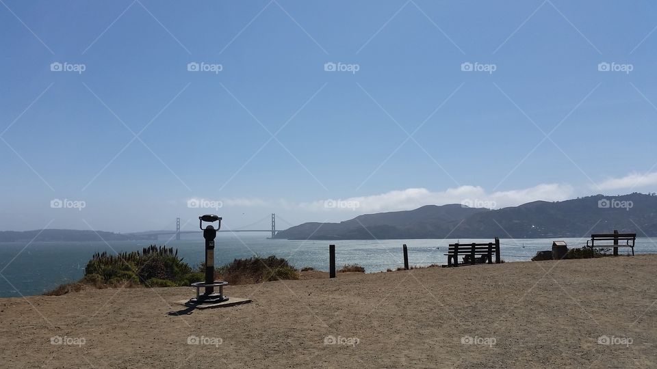 View of coin operated against golden bridge in San Francisco