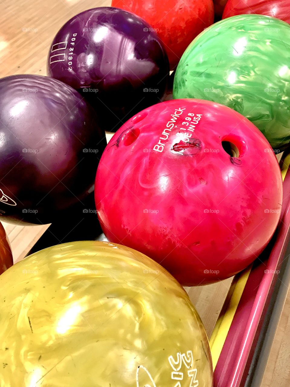 Bright colored bowlingballs.