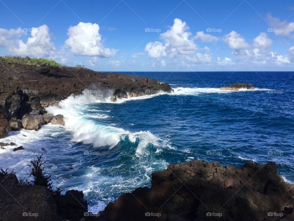 Blue skies, waves, and lava