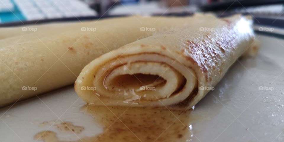 French Crepe with butter, golden syrup and cinammon sugar.