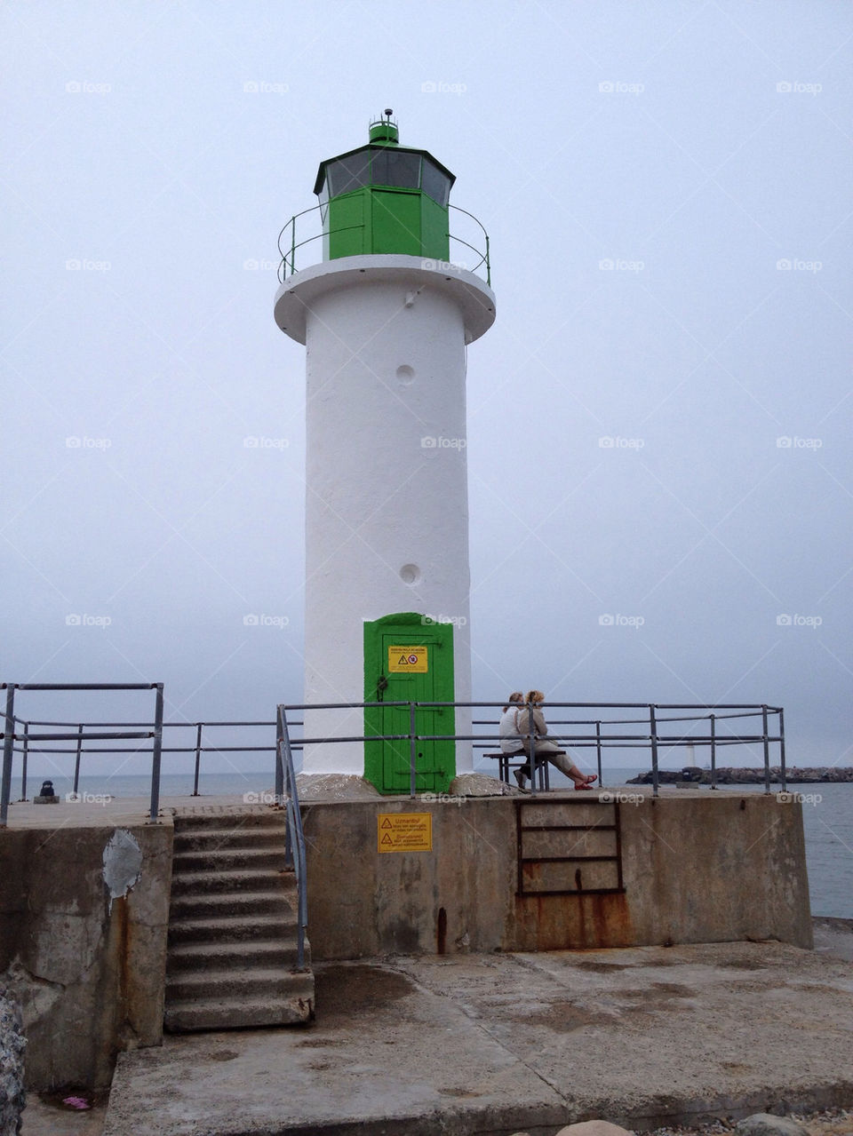 latvia sea lighthouse pier by ips