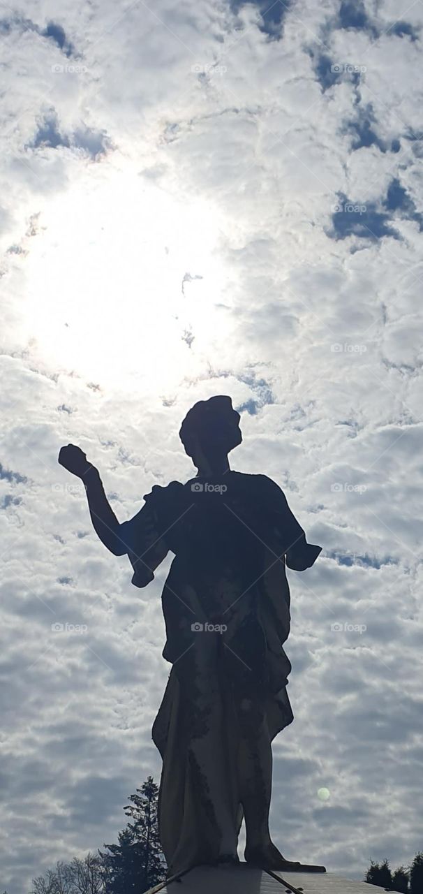 statue in the sky