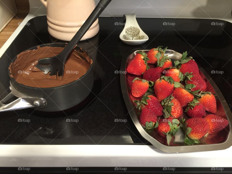 Making chocolate covered strawberries 