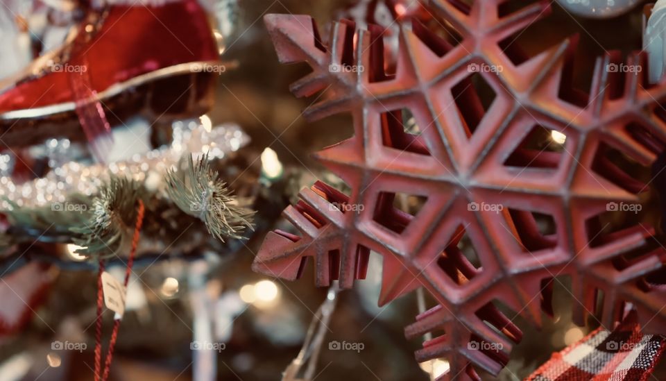 Snowflake Ornament On A Christmas Tree