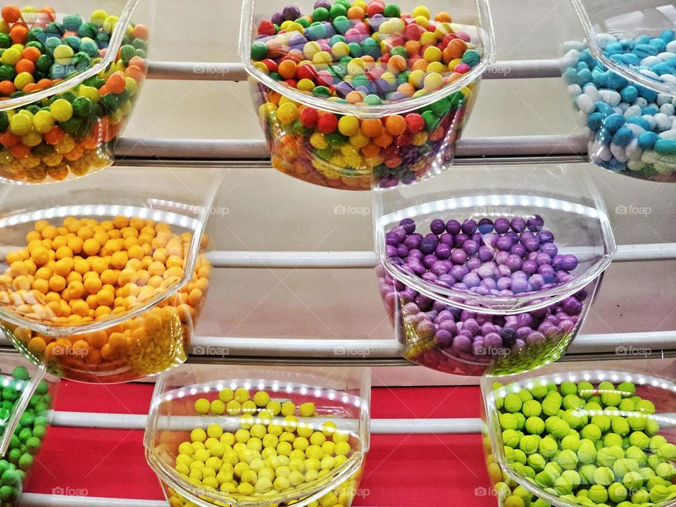 "Colorful candy." Candy has always attracted children,  and colorful candy attracts them even more.  Adults also enjoy these sweets.