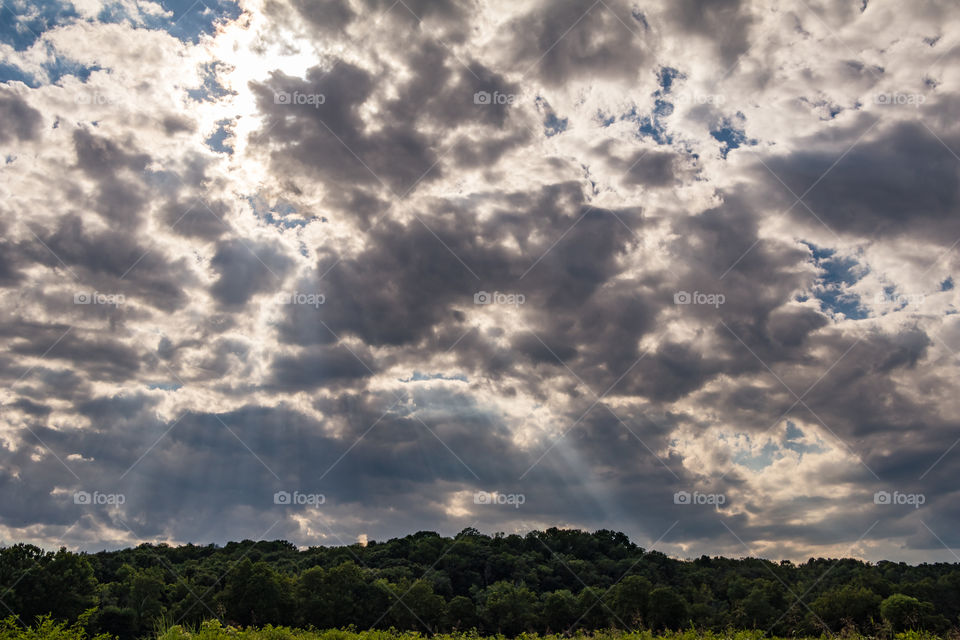 Sun Shining Through Clouds