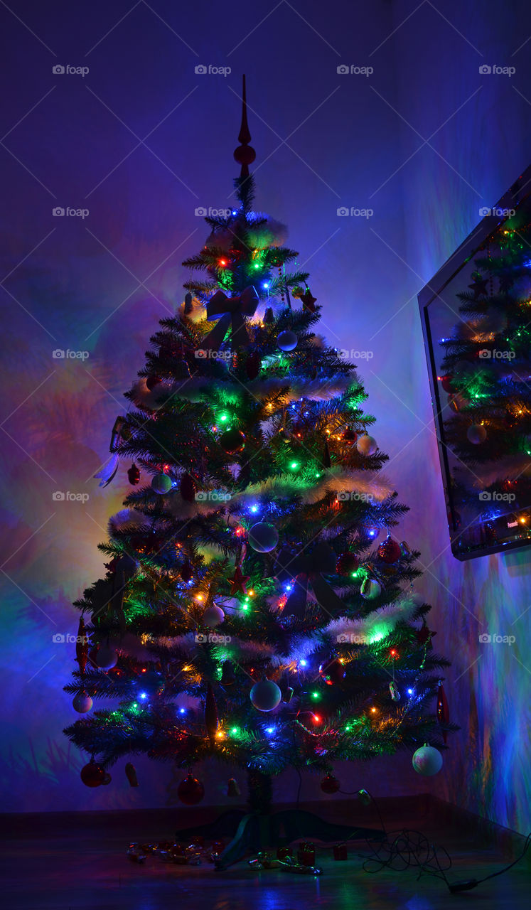 Beautiful modern christmas tree with colored light