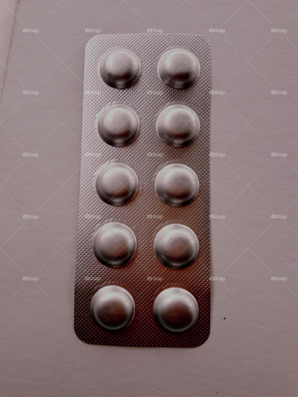 A strip of tablets