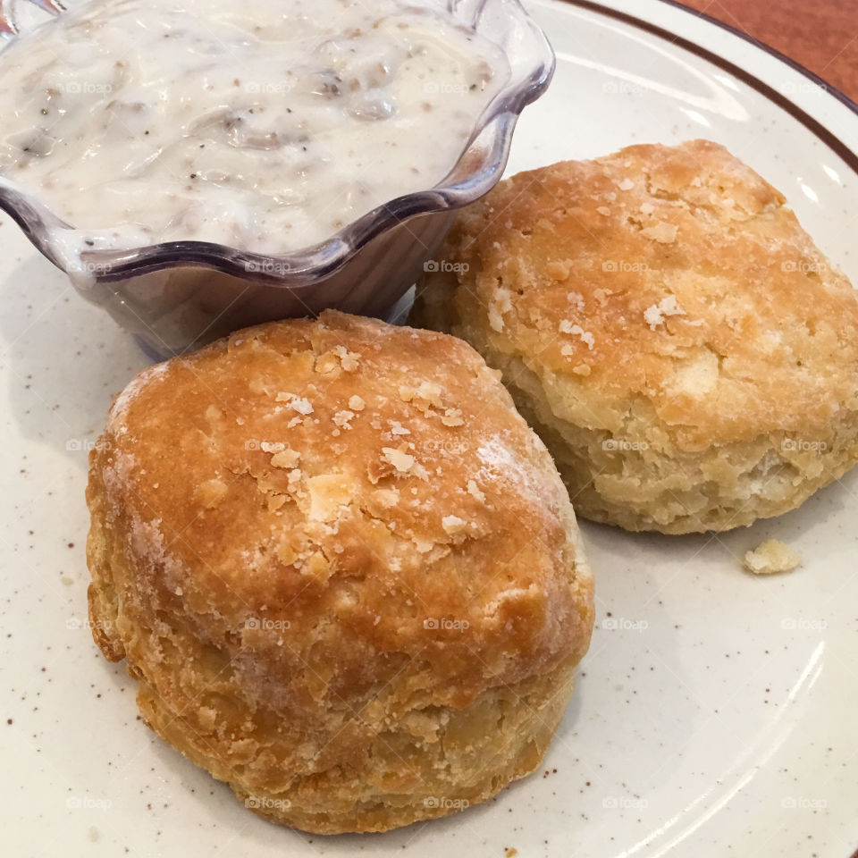 Square photo of biscuits and gravy, side dish.