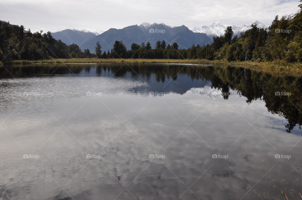 picturesque New Zealand landscape reflected in a lake