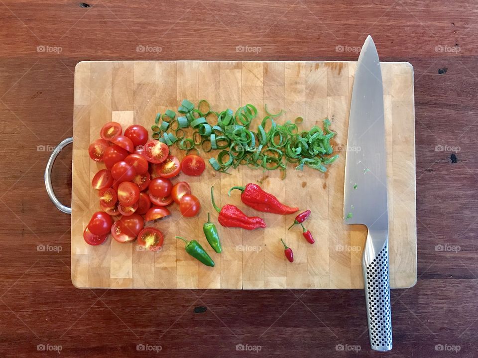 Chopping ingredients for an omelette 