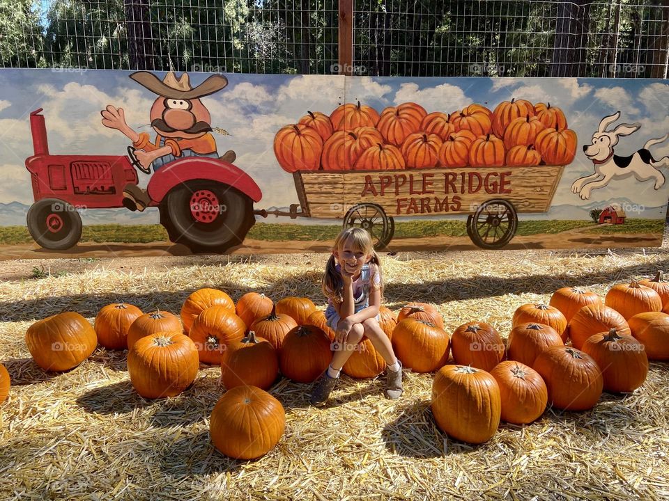 The cutest little girl in the whole pumpkin patch! 