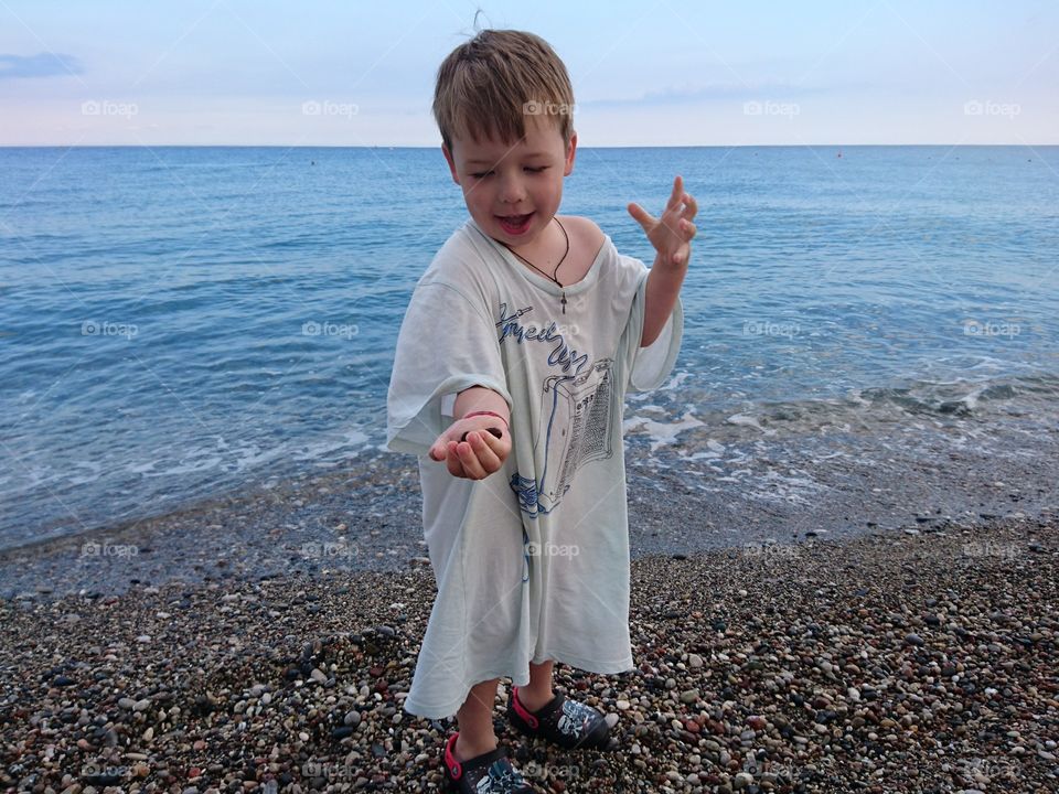 Joyful child on the beach