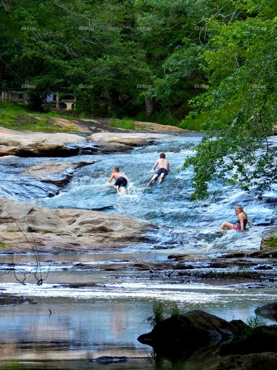 Cooling off from the summer heat at Victoria Bryant state park in Georgia