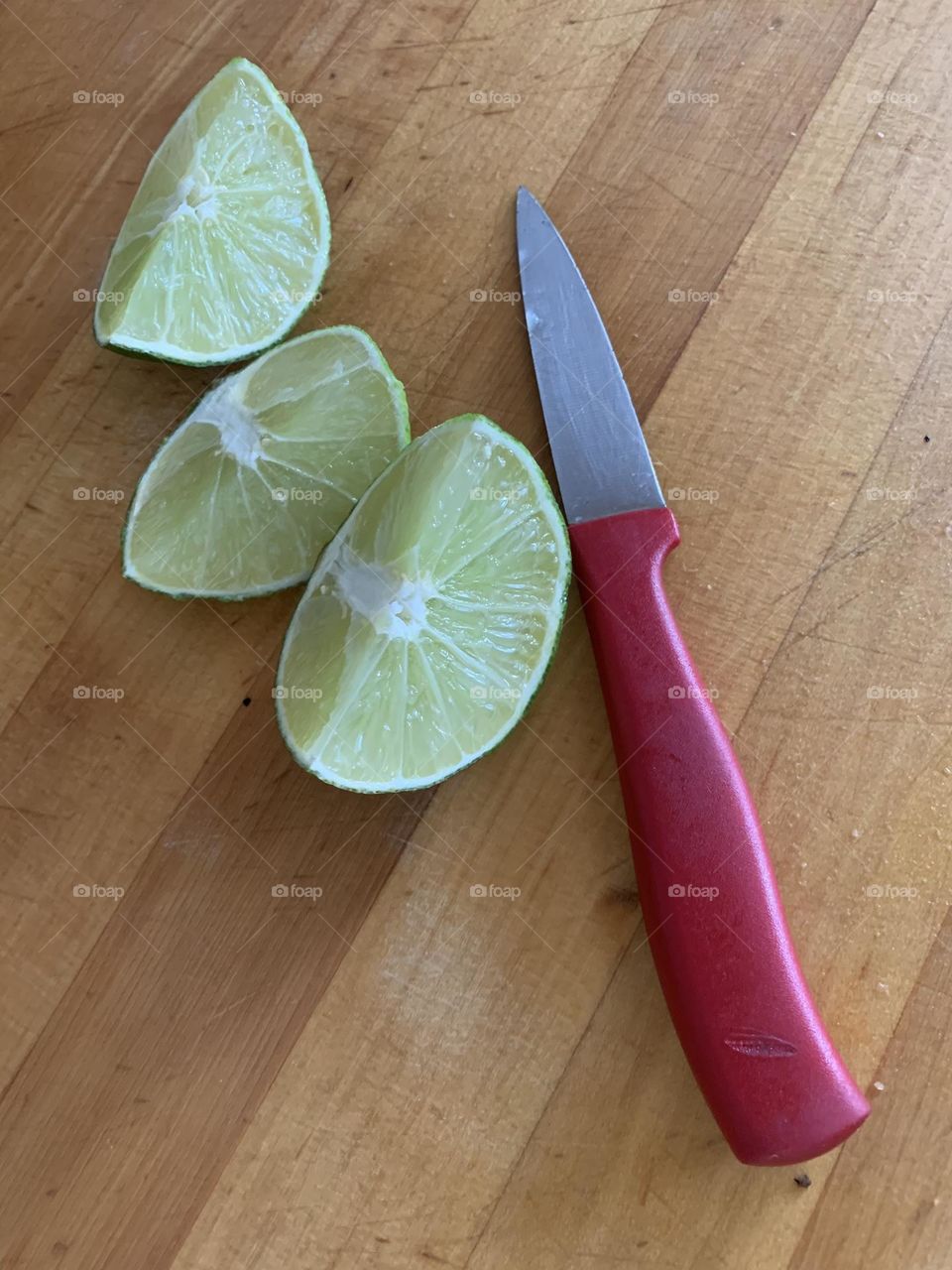 Lime wedges and knife