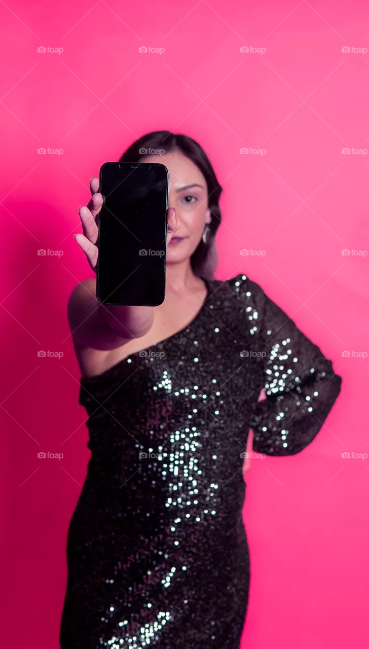 Woman holding Phone stock photo