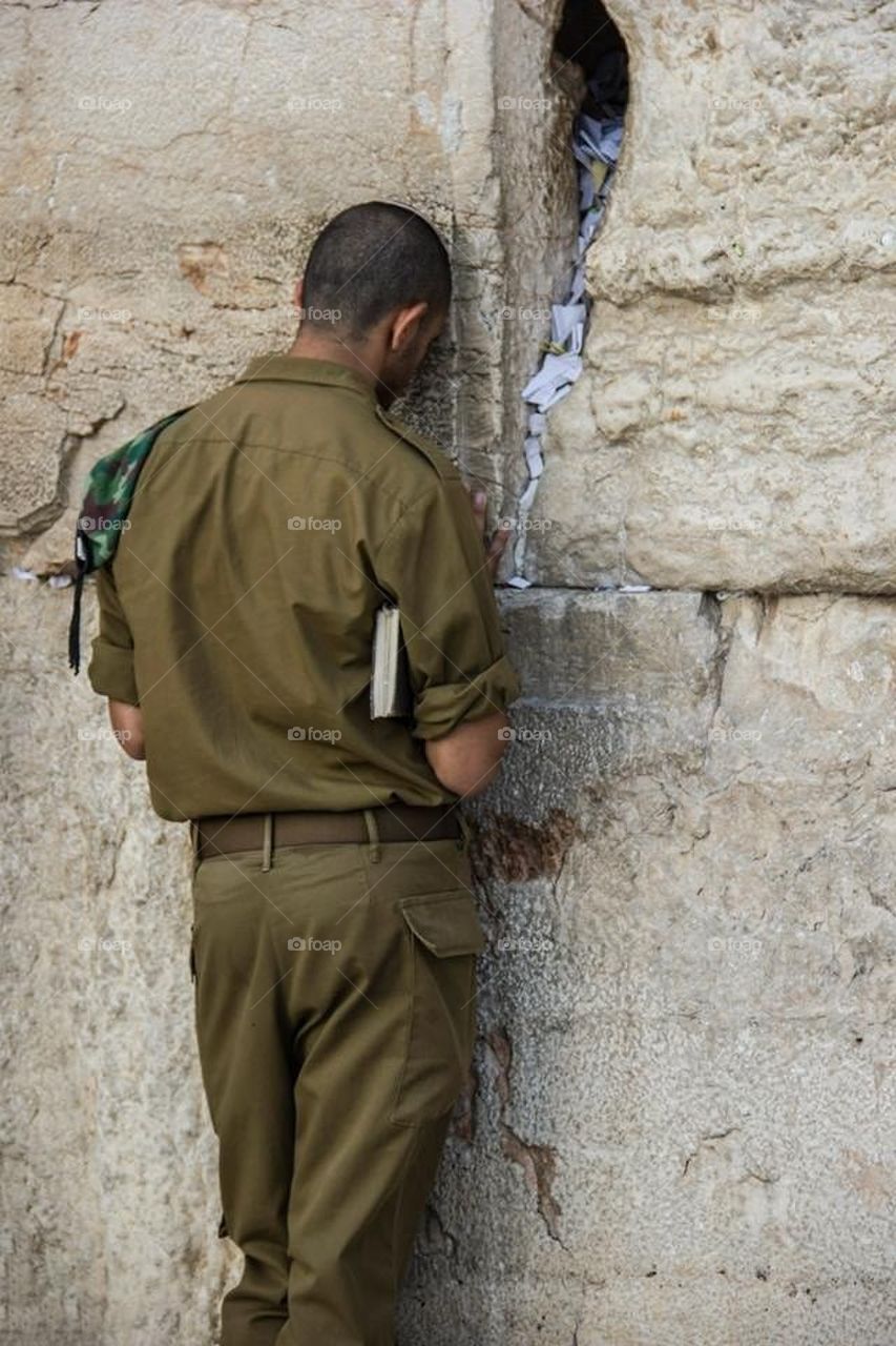 Soldier at the wailing wall