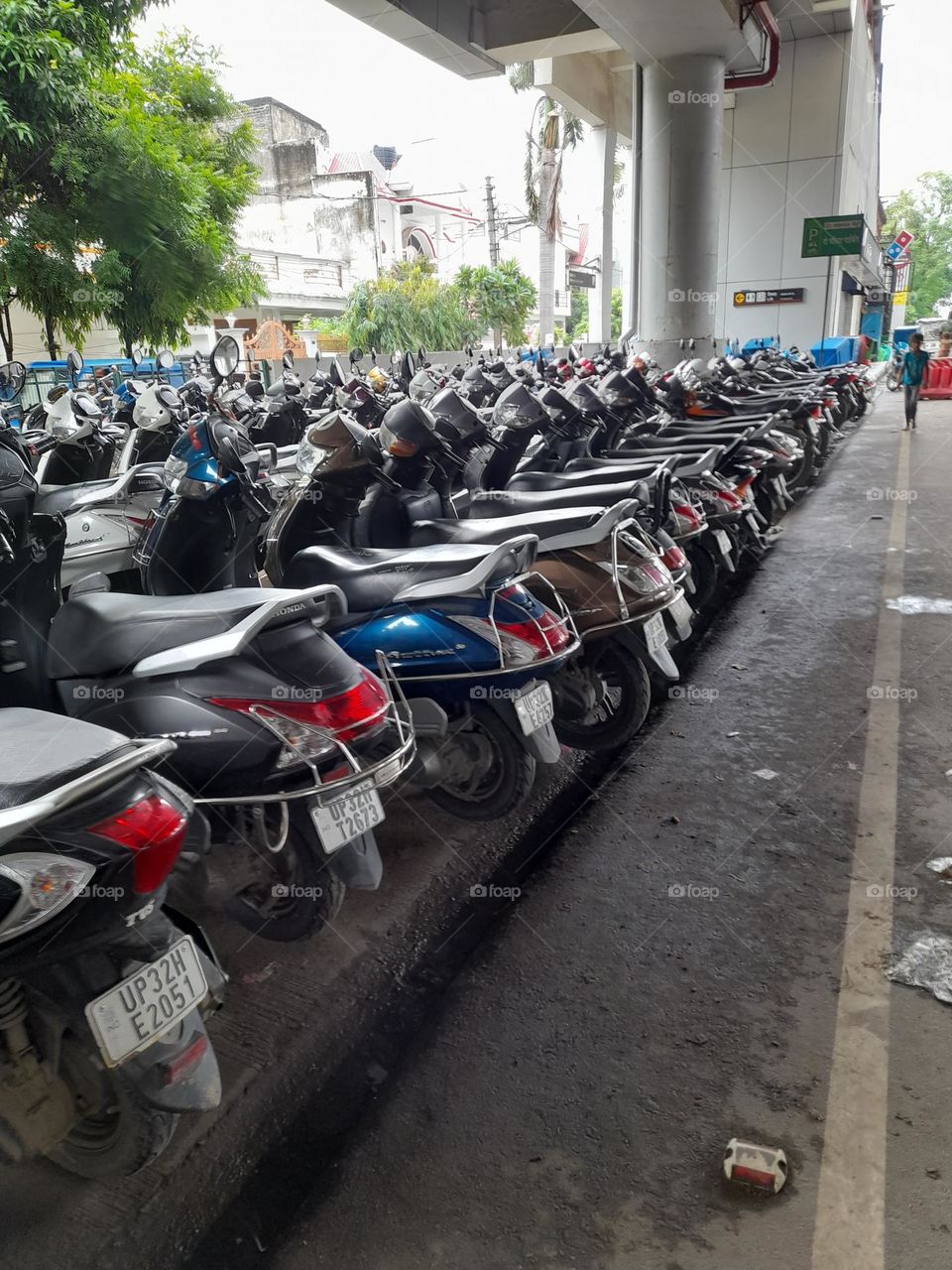 scooters in the parking..how beautifully arranged.