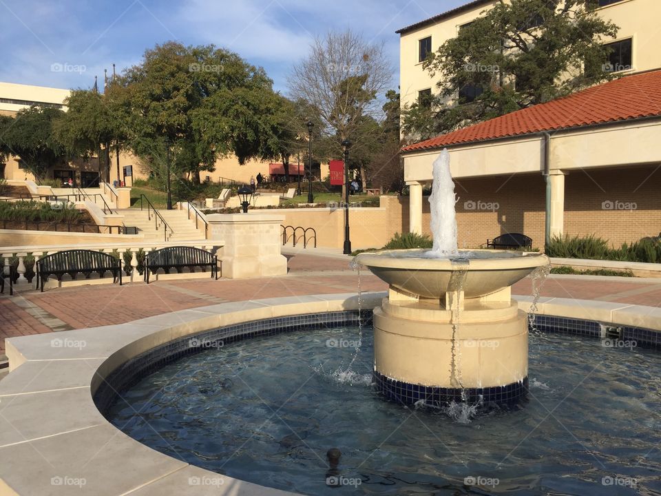 Sun bathed fountain at Texas State University in San Marcos, Texas.