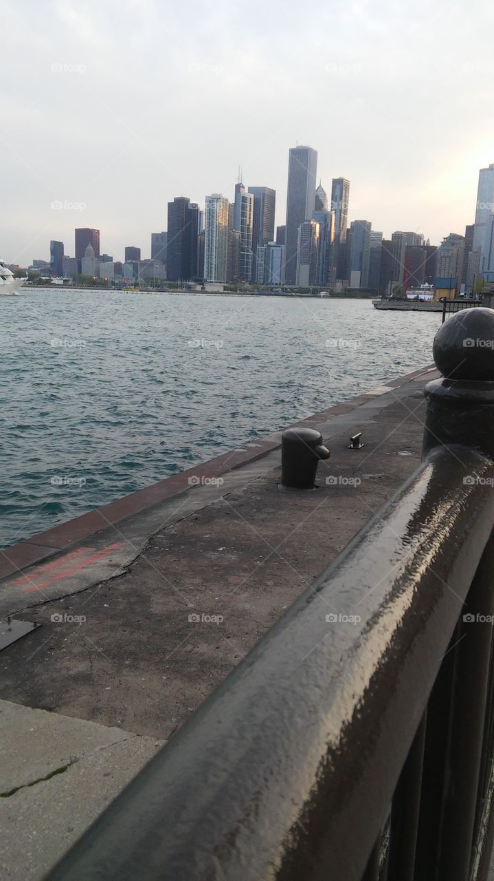 This picture of the Chicago skyline was taken at the edge of a pier in the middle of the lake