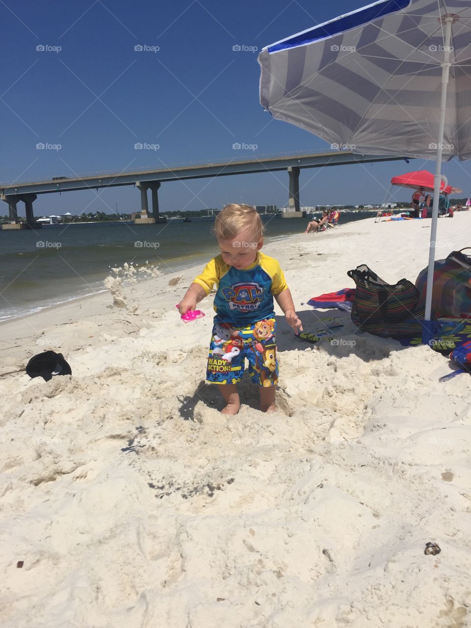 Playing on the beach in the sand