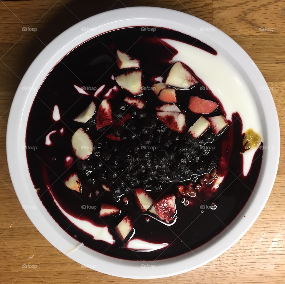 Blueberries, apple and yogurt.