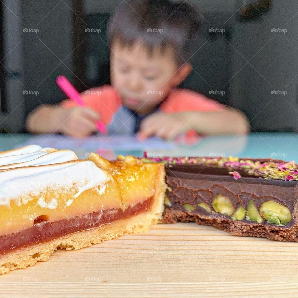 Perfect duo tart in chocolate pistachio rose tart and lemon strawberry meringue tart