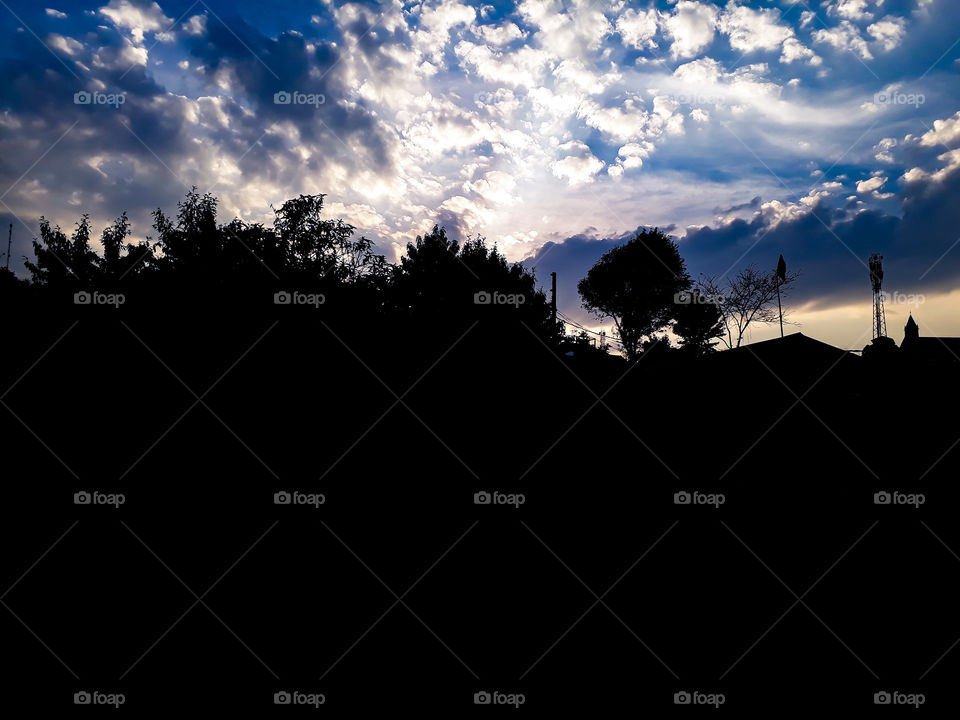 Silhouetted landscape during dusk