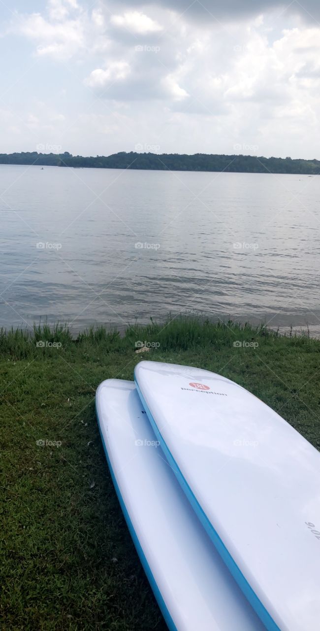 Paddle boarding for two on a calm Tennessee lake 