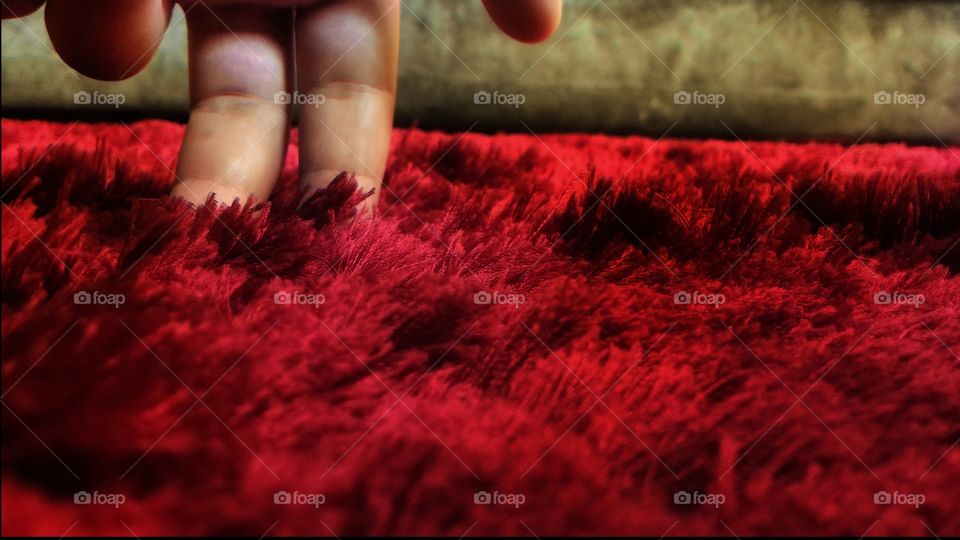 abstract fingers at the red carpet