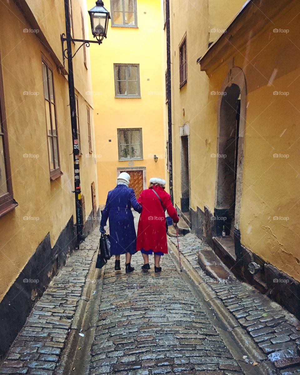 Old ladies walking on street