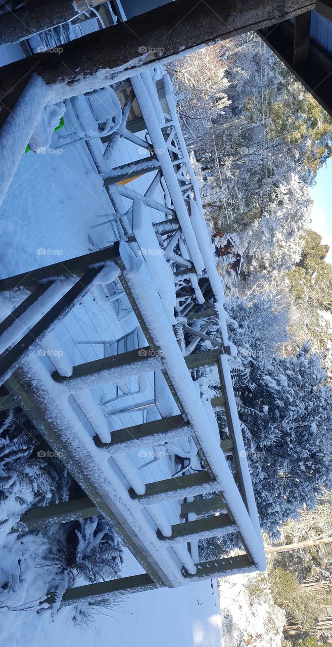 snow covered deck