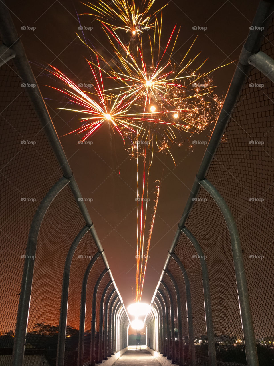 playing firework on the bridge
