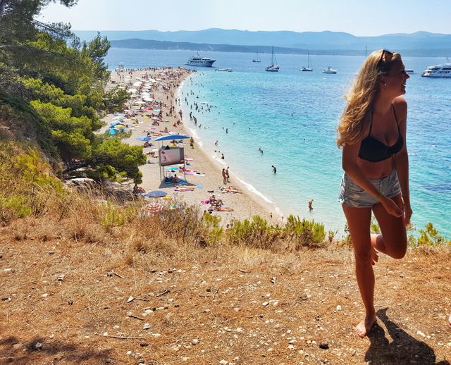 Woman standing near beach