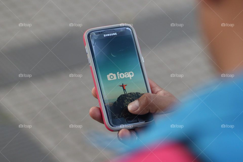 Person is using foap app on a smartphone