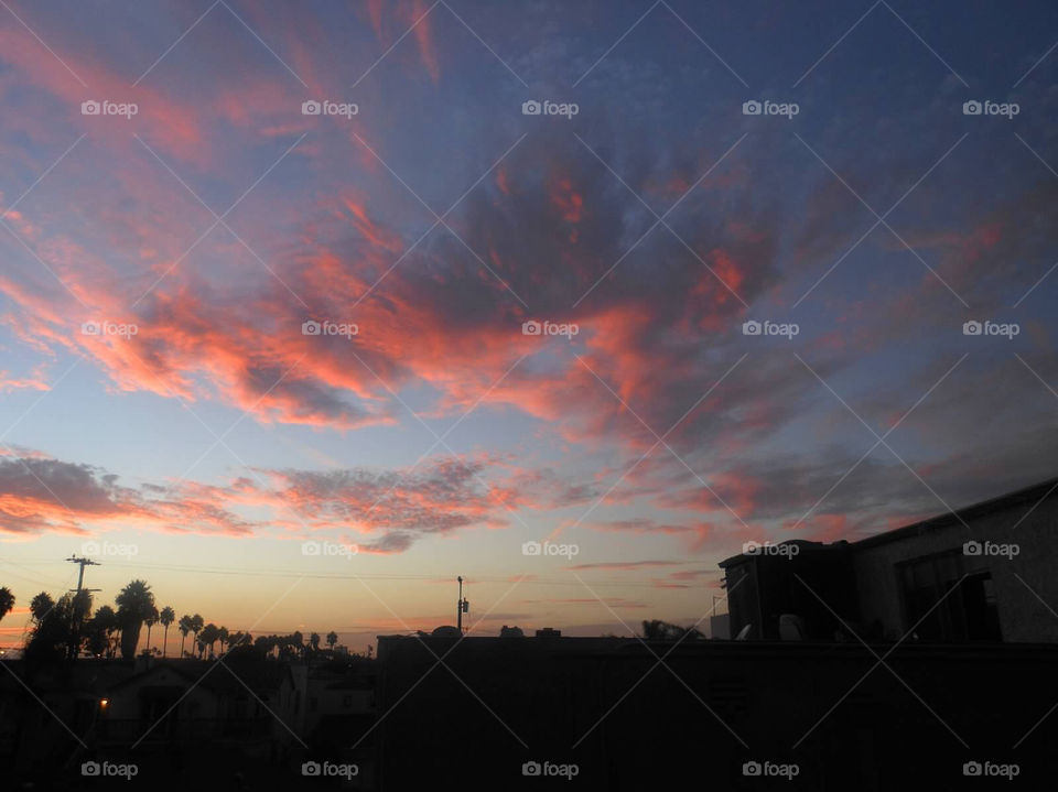 Symphony . Sunset over rooftops