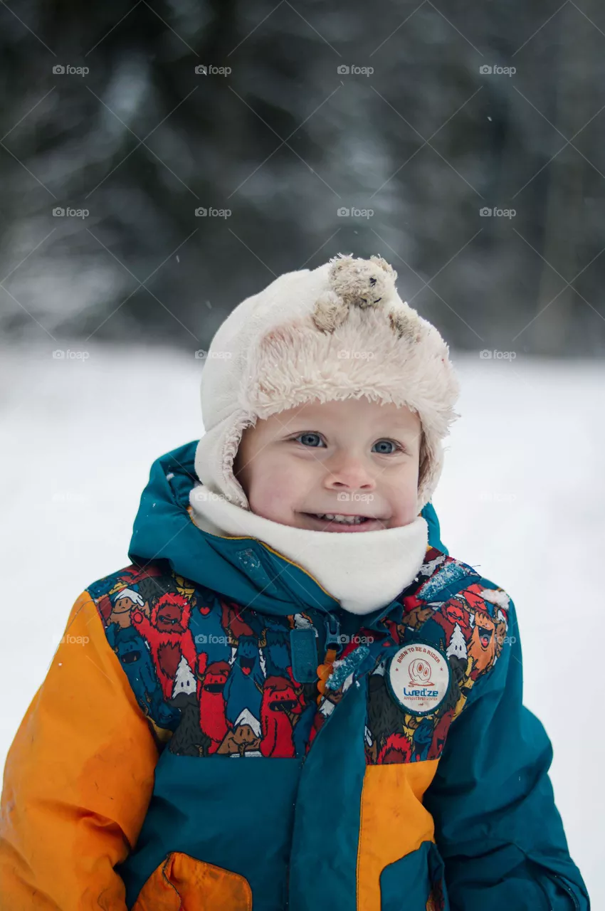 Smiling little toddler boy.