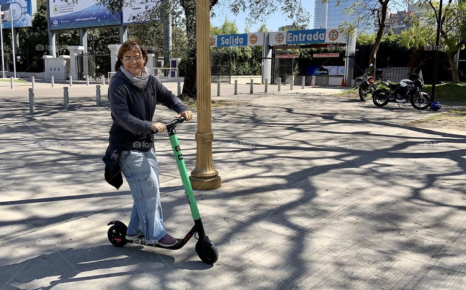 Woman in scooter . Buenos Aires 