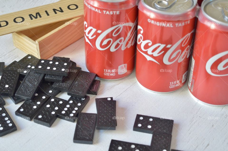 Heysix pack of Coca-Cola cans with dominos 