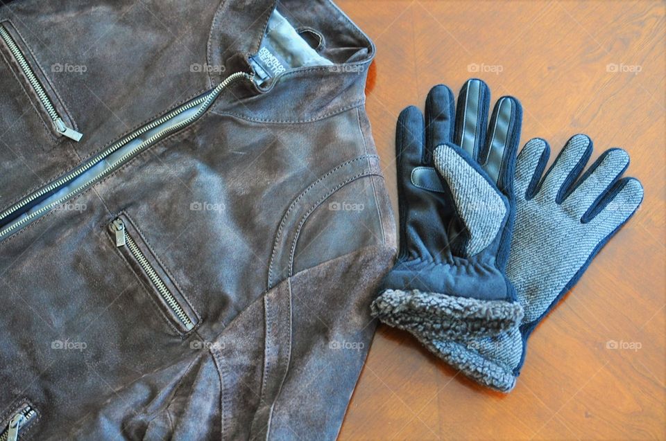 Winter fashion. Leather jacket and gloves
