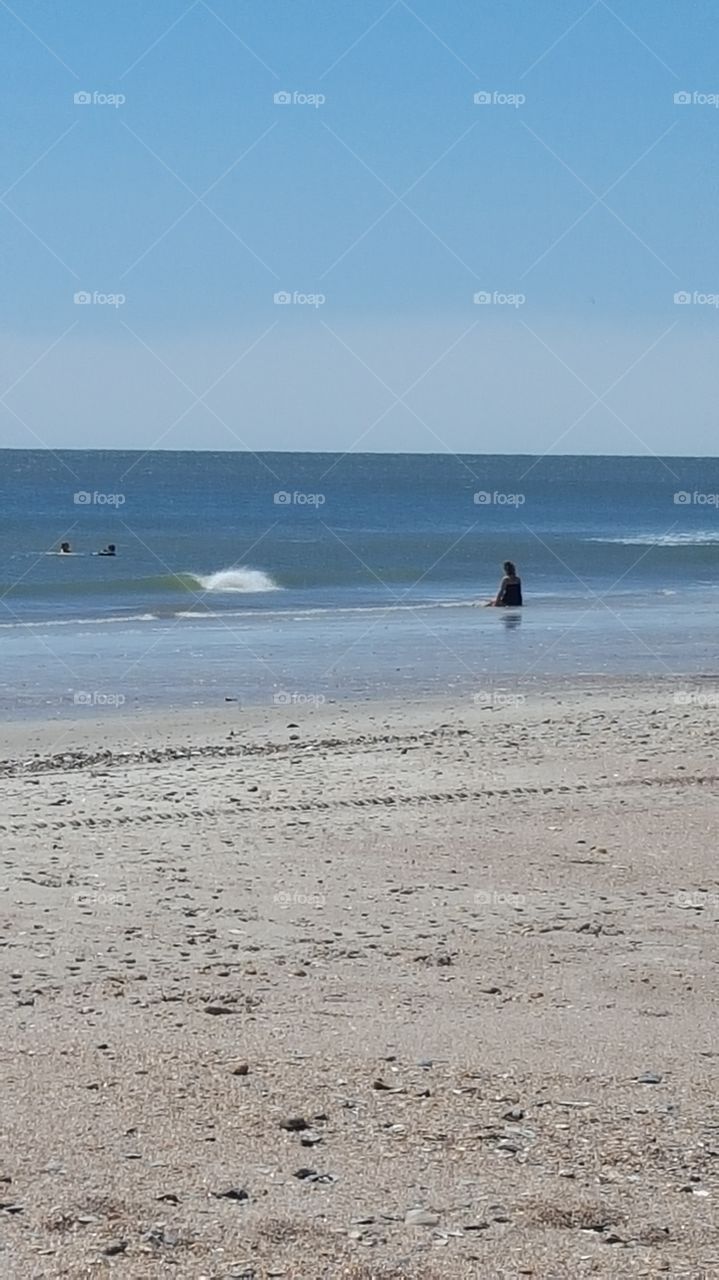 playing  in ocean