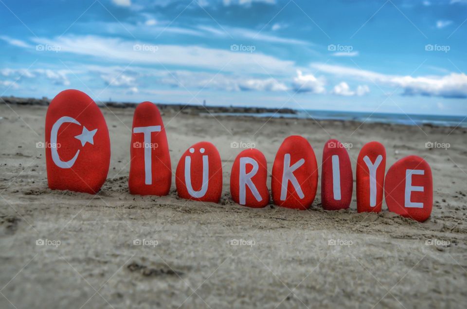 Turkey, Türkiye with national flag on stones