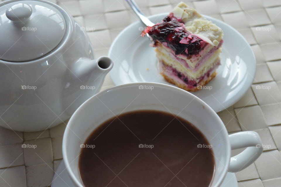 Close-up of coffee with dessert