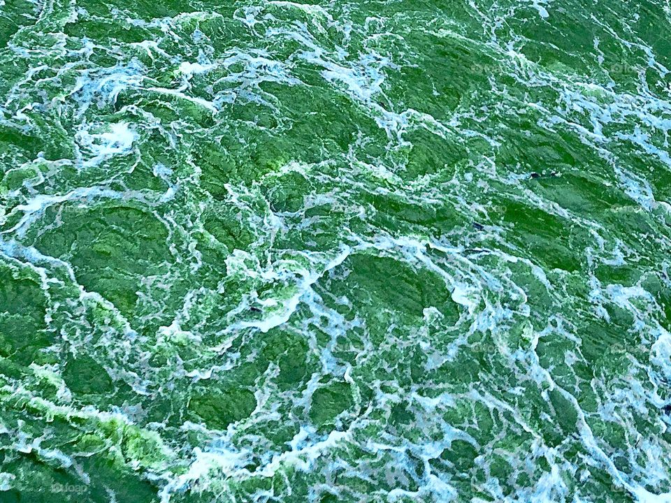 Churning river at flood stage 