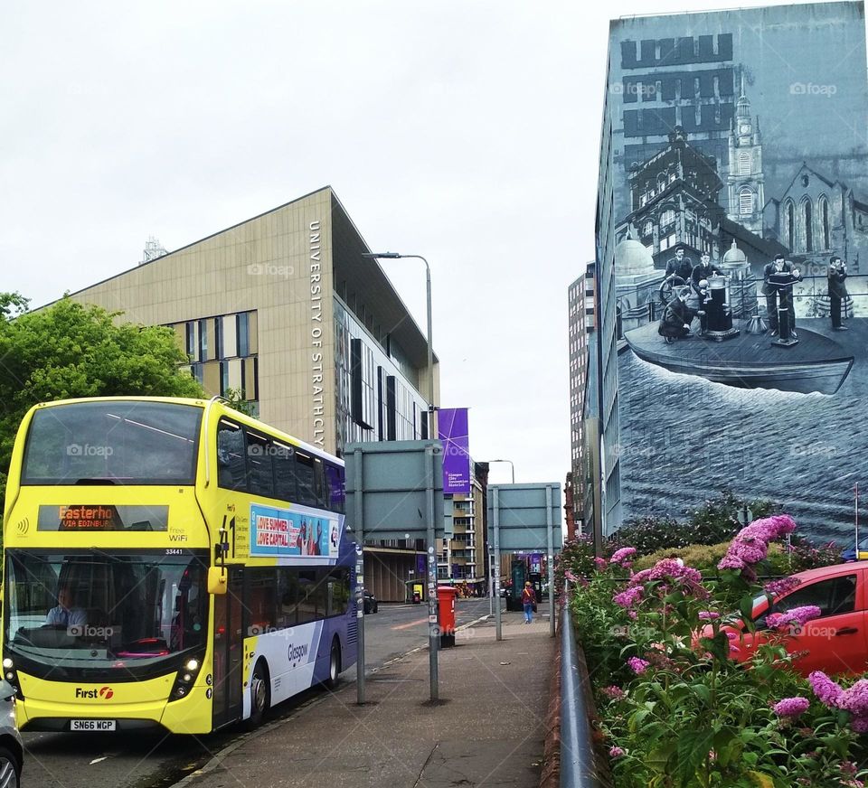 Double decker bus and mural