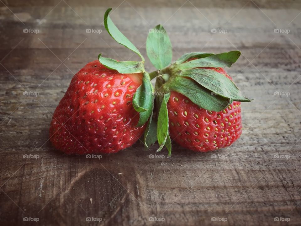 Two fresh strawberries 