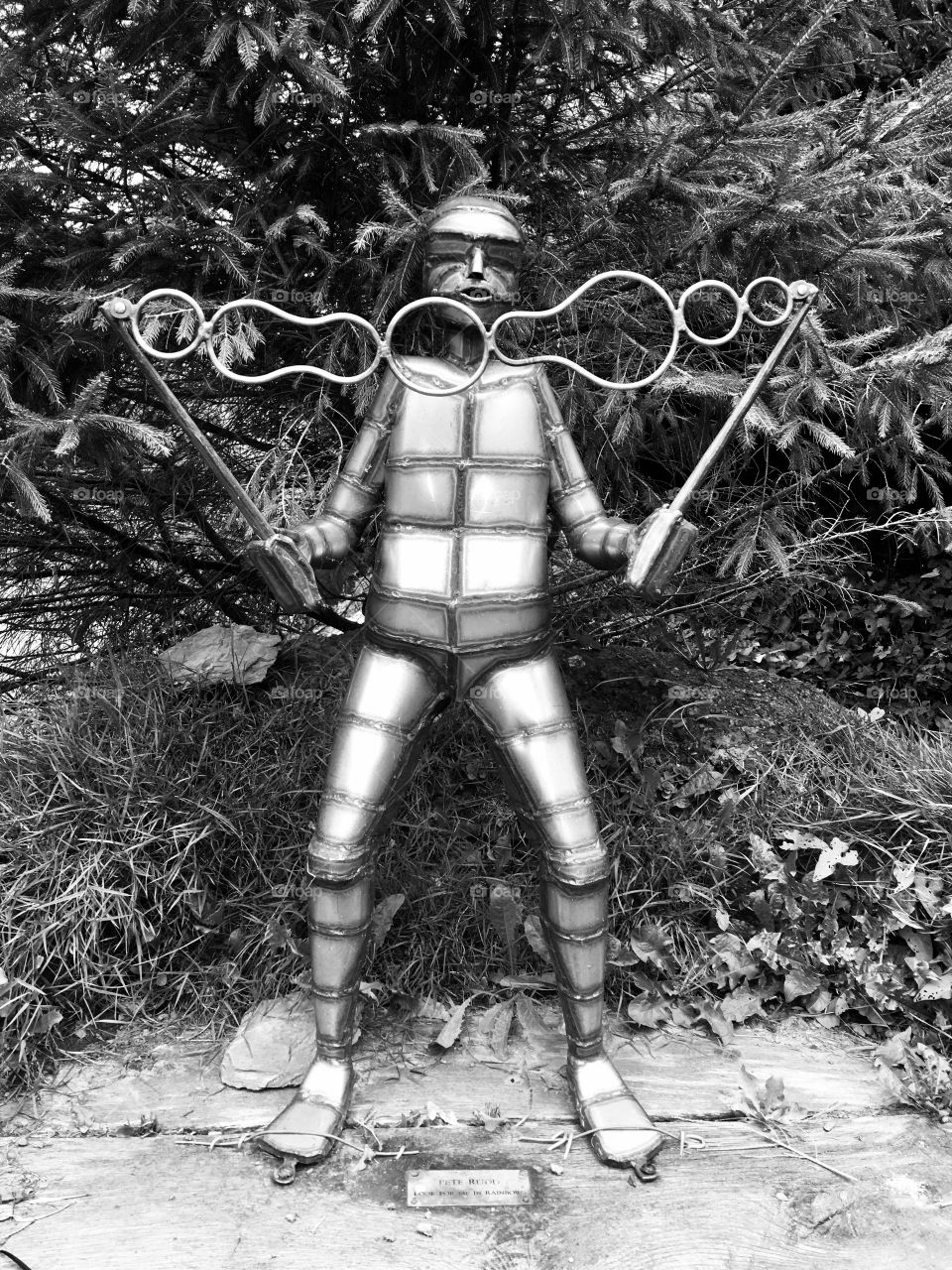 Community garden artwork in Ilfracombe, North Devon, England. Metal work reminds us how much fun it is to be sensory, play and enjoy our child like manner - black and white 