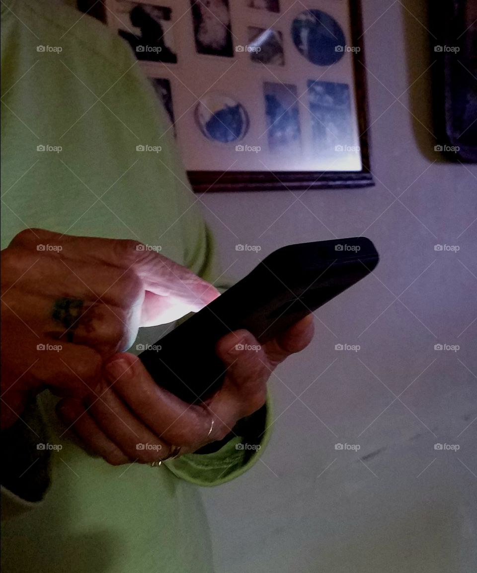 Using cell phone in dark room.