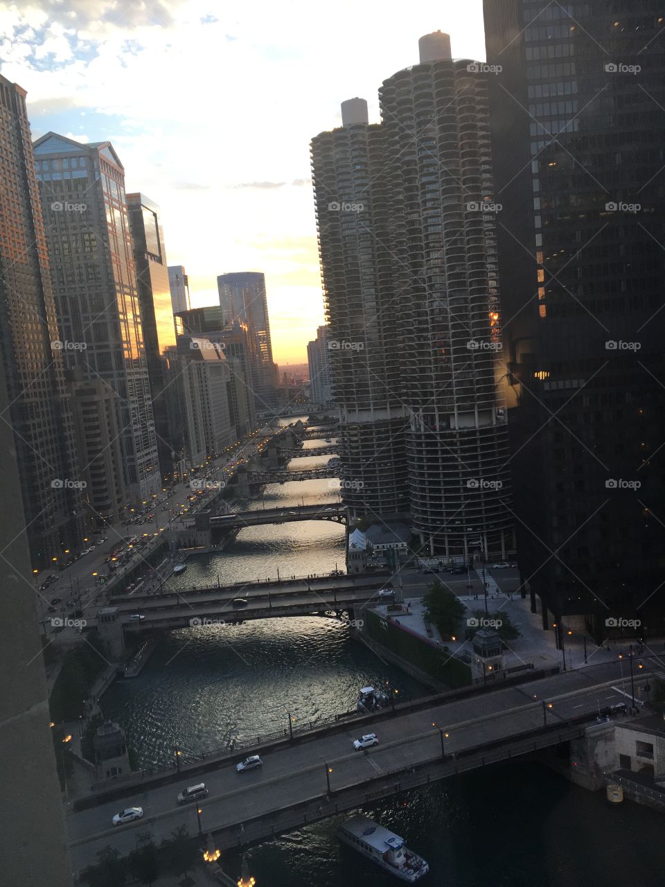 sunset in chicago looking down the chicago river 